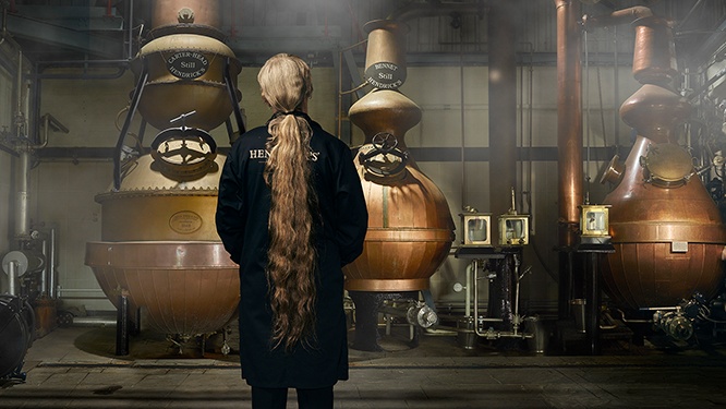 Lesley Gracie overlooking the three stills inside the distillery at Hendrick’s Gin